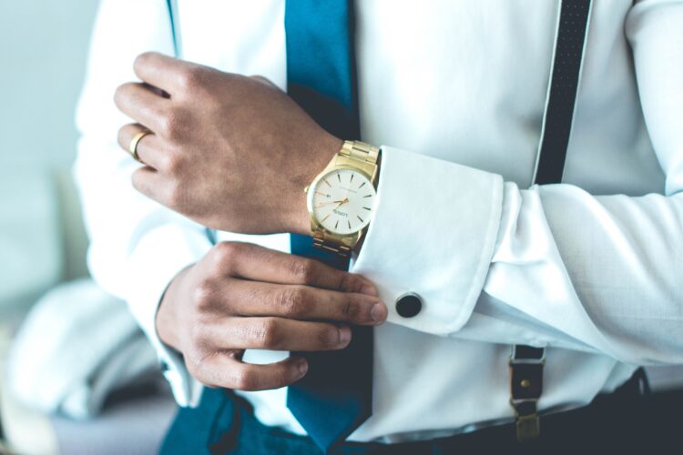 Man showing off his newly repair Rolex watch in New York, NY.